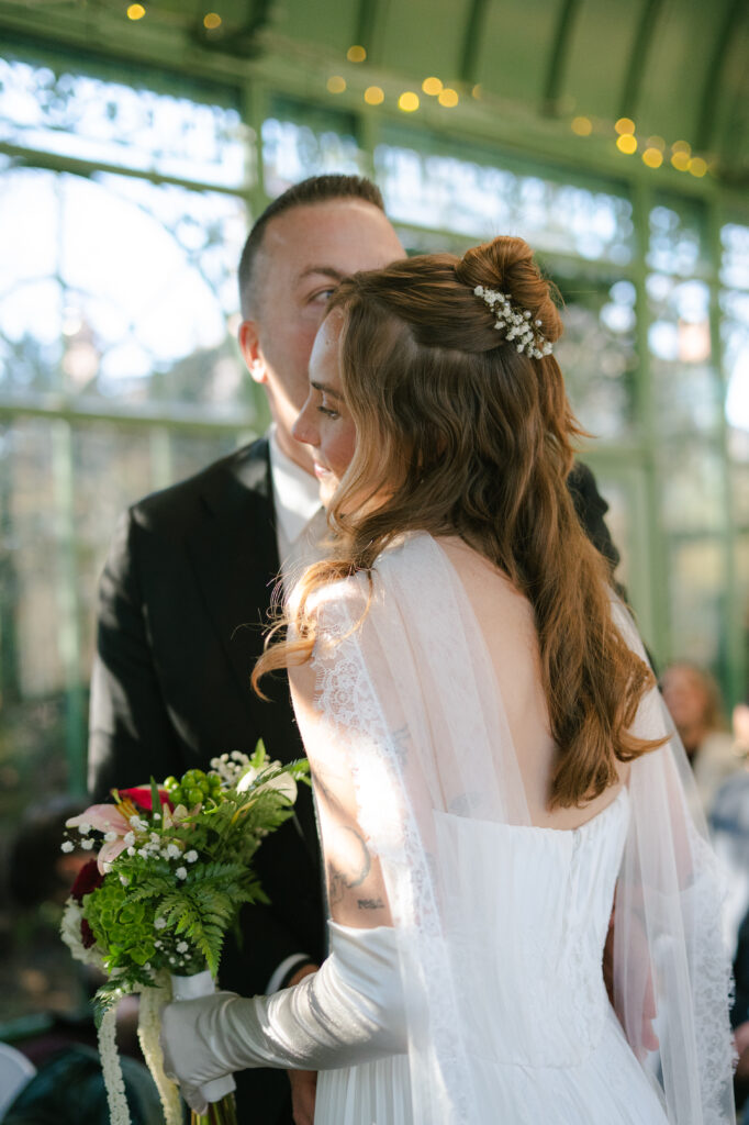 Father of the bride giving her away to her new husband